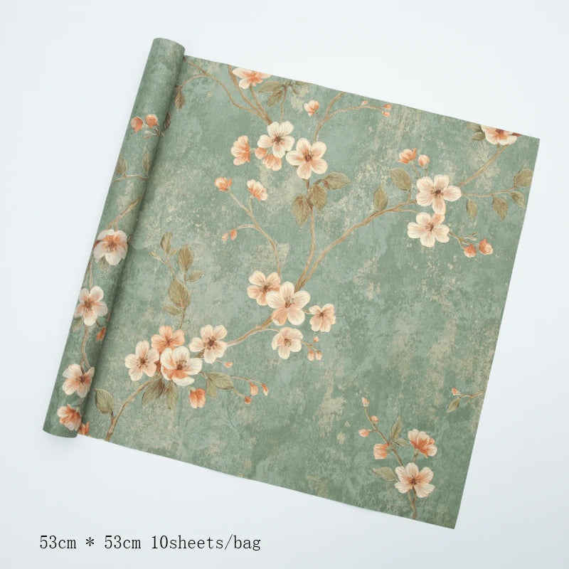 Geschenkpapier mit geprägten vergoldeten Blumen