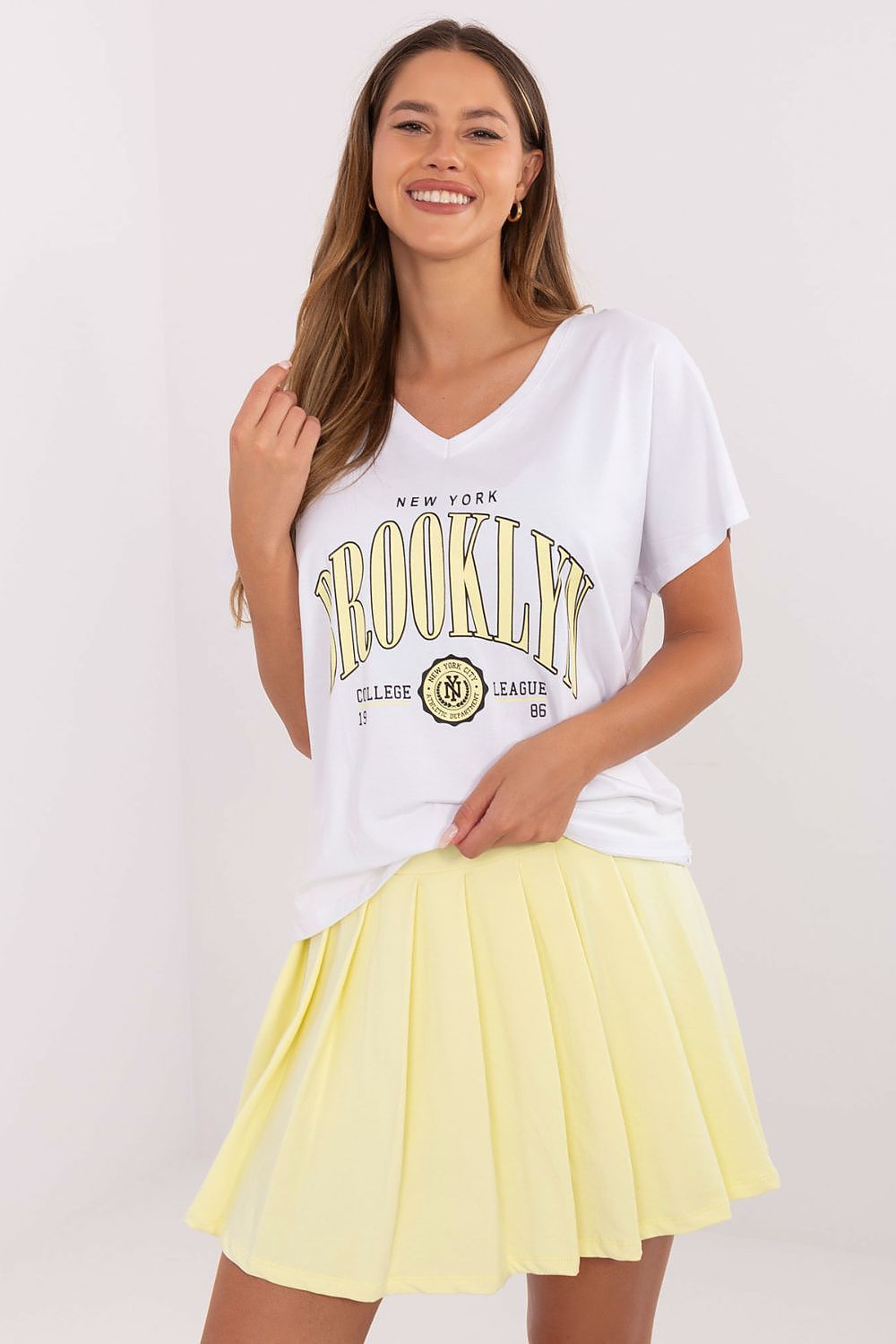 Damen Falten Rock mit Shirt Set gelb weiß von Relevance gelb weiß Vorderseite